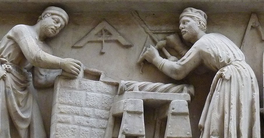 Photo: detail of Renaissance sculptural relief showing sculptors at work