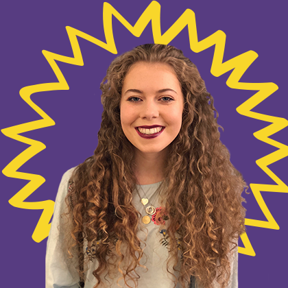 UCD student smiling against a purple background.