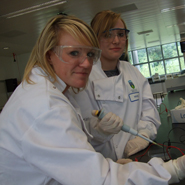 Lisa Dwane and Natalie Delaney from Caritas College learning how to load a DNA gel at the UCD Conway Institute during the UCD Summer School