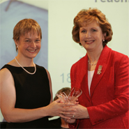 Dr Amanda Gibney receiving her award from the President of Ireland, Mary McAleese