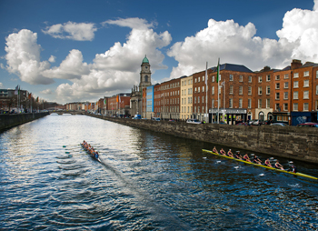 University College Dublin (left) and Trinity College Dublin Senior Women's in competition for the Corcoran Cup along the River Liffey