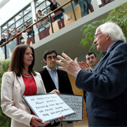 President of Ireland Michael D. Higgins with UCD students Doirean Shivnan, Manuel Sant'Ana and Michael Gallagher