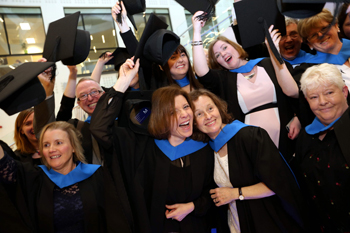 Students celebrate after receiving the awards at University College Dublin
