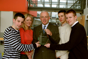 Niamh Prenderville, Stephen Brosnan, Andrew Flood and Daniel Tanase pictured handing over the award to Dr. Martin Butler 