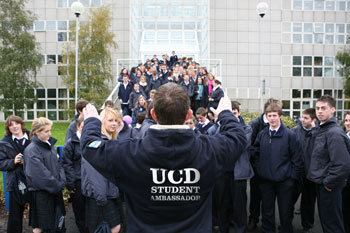 Karl Abbey (front and centre), UCD school liaison prepares transition year students from St Colmcille's Community School, Knocklyon, to divide into groups before they tour the UCD campus