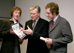 UCD Conway Institute PhD student Stephen Nolan and Adrian Farren 5th year pupil at Scoil Mhuire, Buncrana receive their prizes from Mr Pat Kenny at AccesScience 06. Stephen took first place as best speaker while Aidan emerged as secondary category and winner in the poster competition for best visual representation of science. 