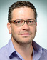 Assoc. Prof. Tom Wilkinson