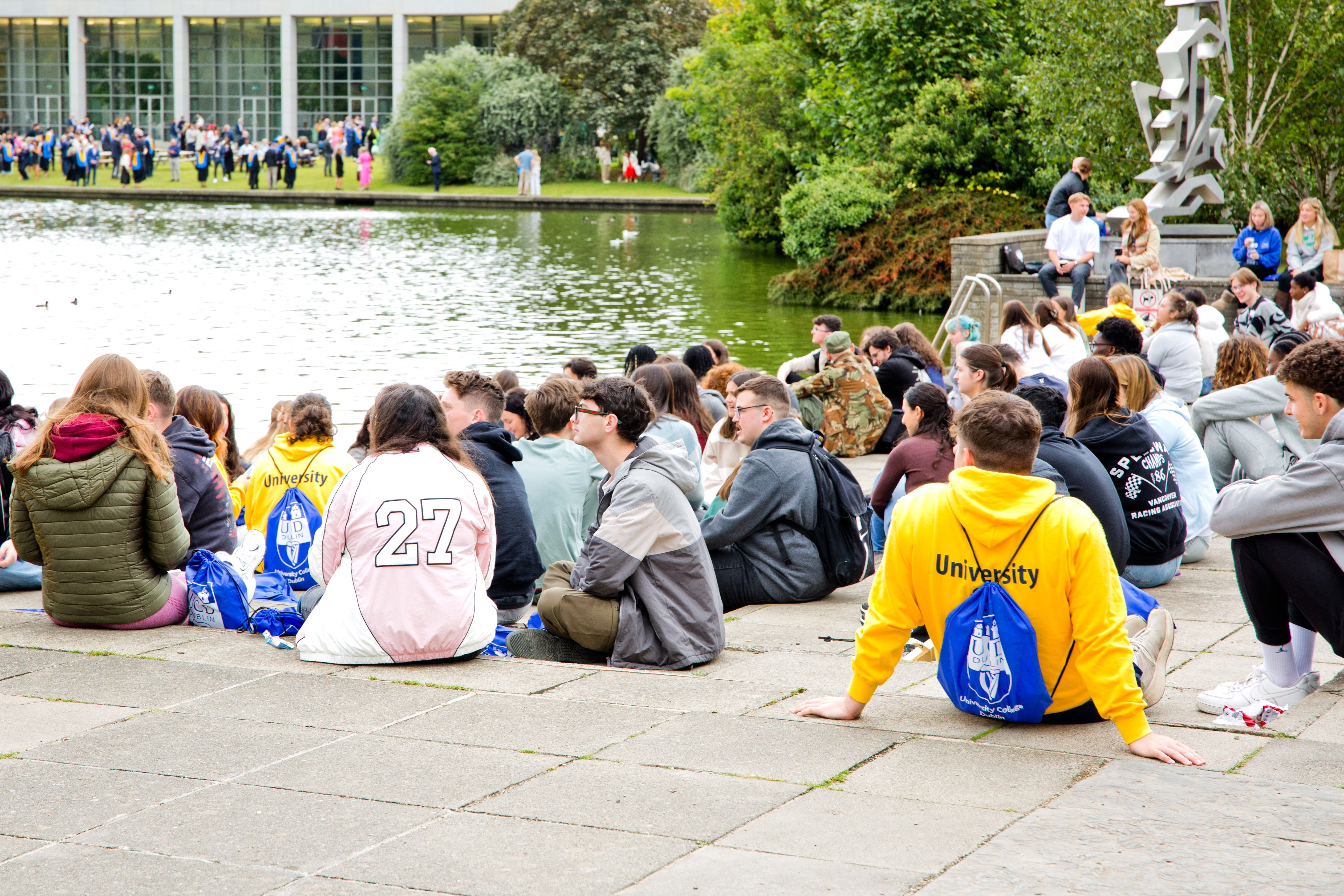 Students sitting outside in the campus