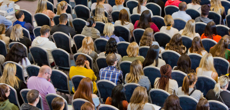 Overhead photo of students in a lecture theatre