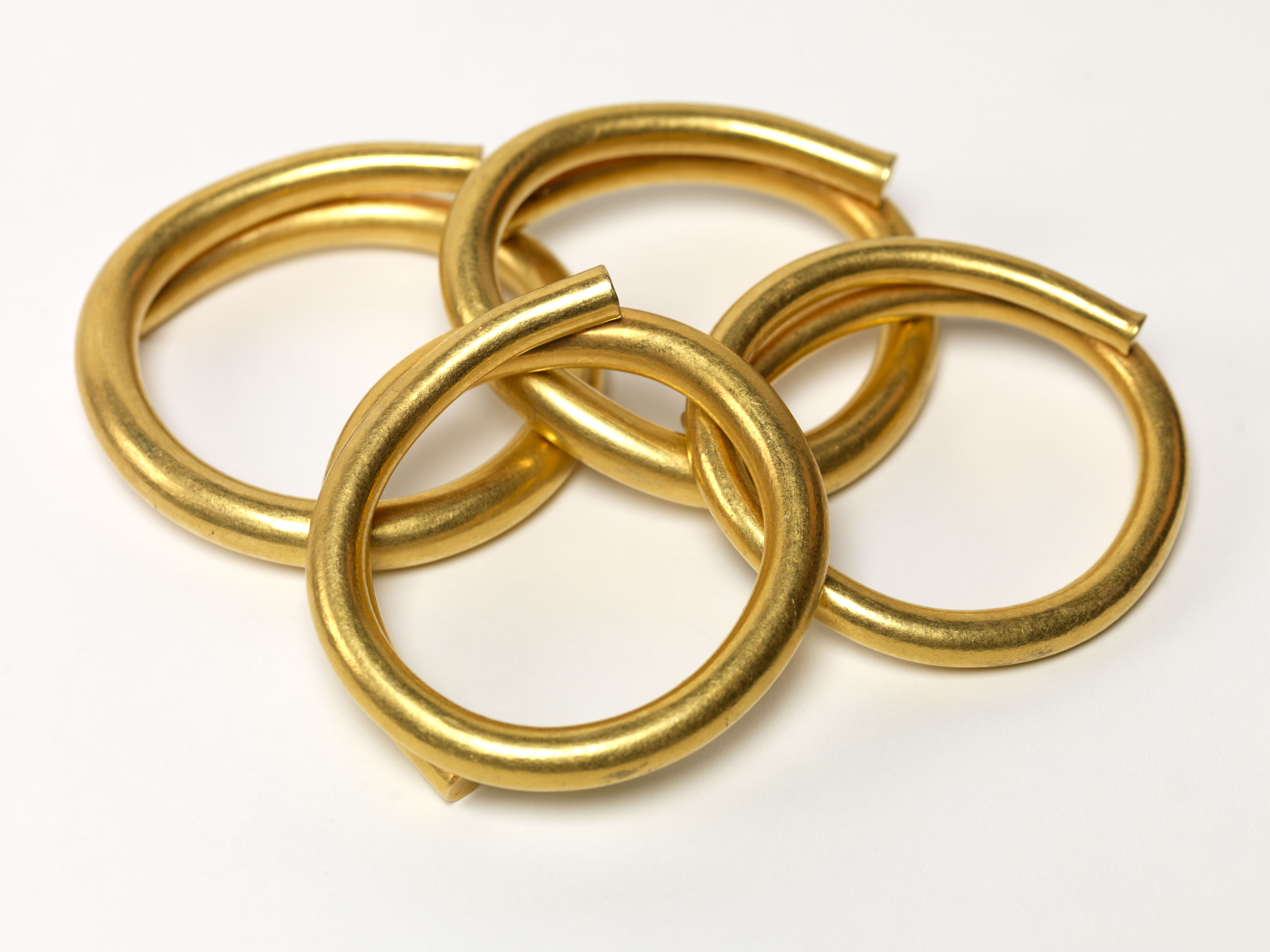 4 bronze rings overlapping each other into a circle