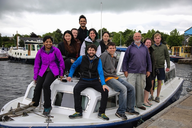 Various MSc students on a boat