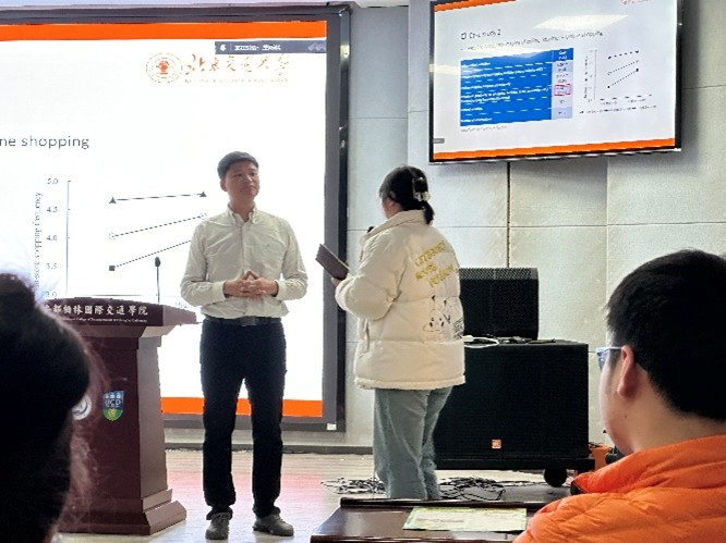 Group members engage with Dr. Shi during the Q&A session