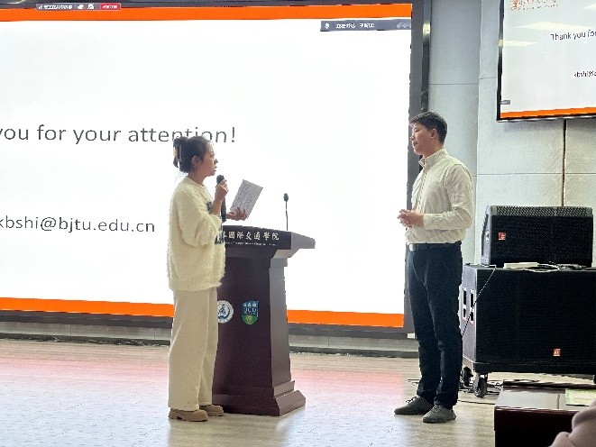 Group members engage with Dr. Shi during the Q&A session