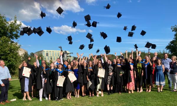 Students celebrating their conferring