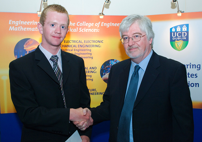 2010 Winner Brendan Cunningham is congratulated by Professor Don MacElroy.