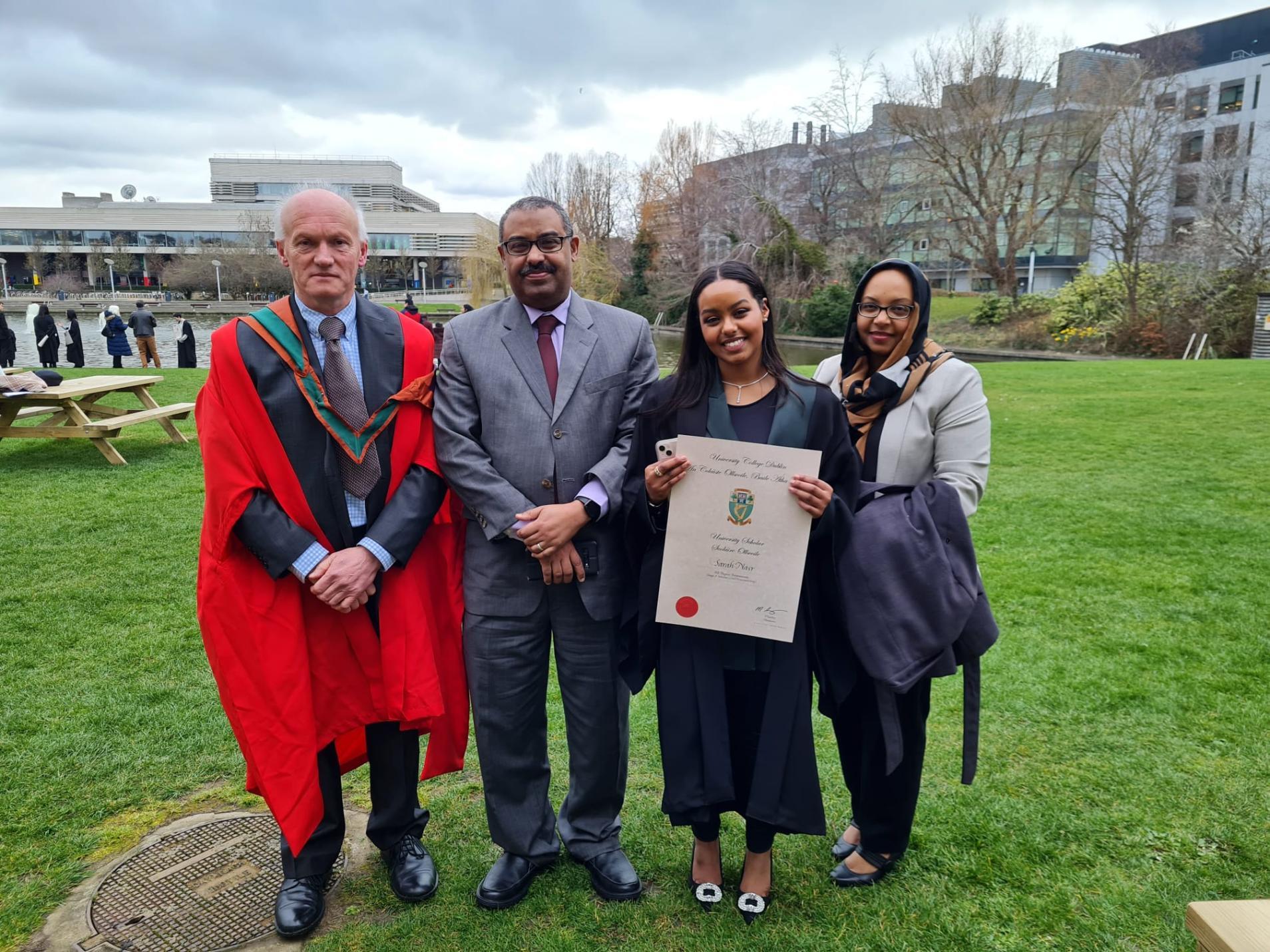 Associate Professor PJ Purcell with awardee Sarah Nasr, and her parents Ahmed and Zeinab