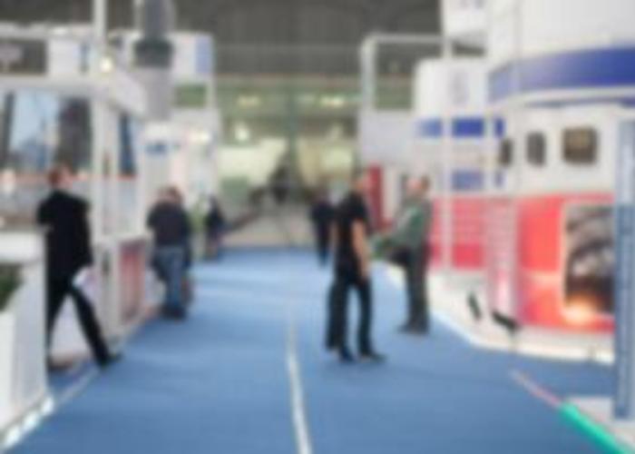 Blurred view of attendees at an exhibition
