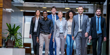 An image of a group of interns arriving to work