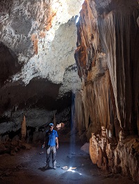 Nick Scroxton in a cave