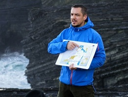 Simon Barker on a coastal rock formation