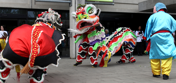 Images of dancing dragons at the UCD Festival
