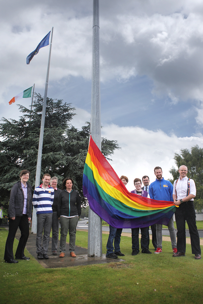 UCD Staff and Students raise the rainbow flag as part of Dublin Pride week