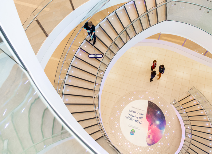 a person cleaning stairs