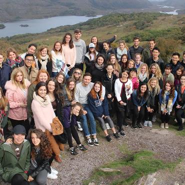 Group of students on top of a hill