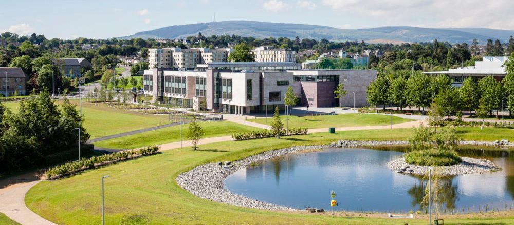 View of UCD Campus with a lake in the foreground