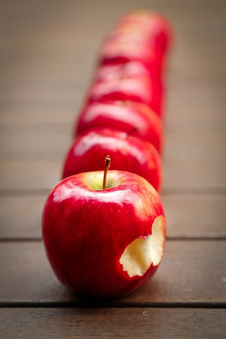 Line of red apples
