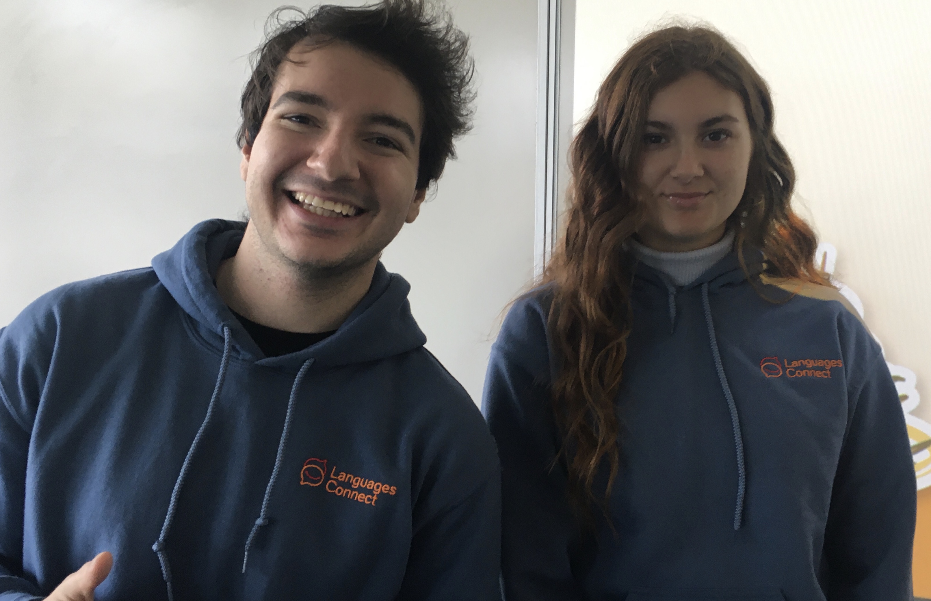 Two student ambassadors in blue sweaters