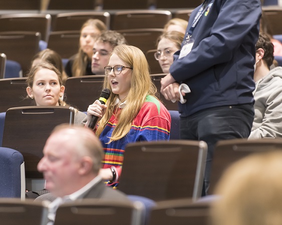 A law student asking a question during the Q&A session