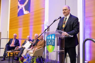 Left to right on stage: Prof Michael Keane, Prof Niall O Higgins, Dr Patrick Felle, Prof Kevin O Malley, and Assoc Prof Mick Molloy standing at podium