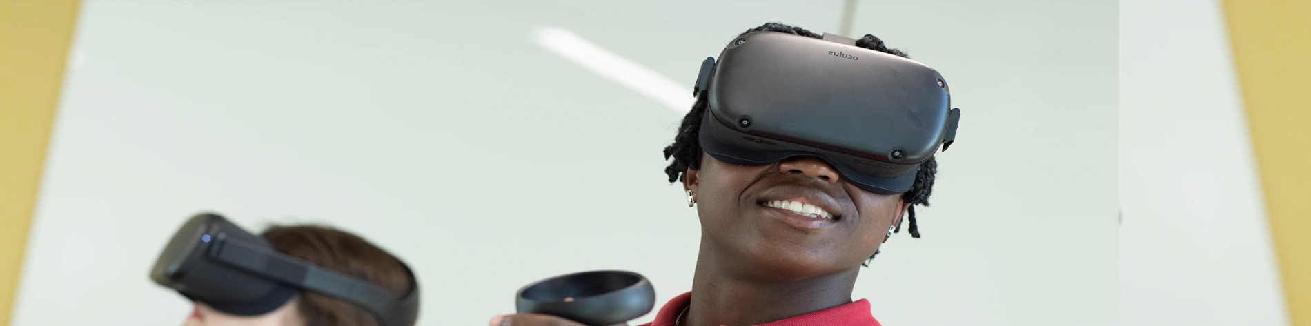 Young man wearing virtual reality headset.