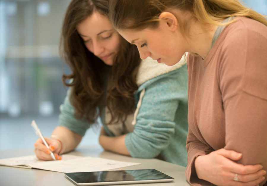 Students reviewing a document