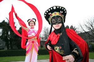 Pictured Far-Right: Ms Liu Yi from the Sichuan Opera Troupe (background) who performed Chinese Dance (Shuixiu wu) and Mr Yang Hong from the Chengdu Opera Troupe who performed Face-changing (Bianlian) at the UCD Confucius Institute for Ireland, Chinese New Year Celebrations at University College Dublin on Friday 08 February 2008.