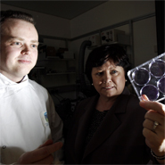 Prof William Gallagher, UCD Cancer Researcher and Minister for Health, Ms Mary Harney TD viewing scientific samples