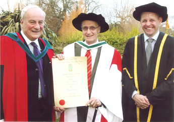  Dr Patrick Masterson, Former President of UCD (left), and Dr Philip Nolan, UCD Registrar (right) pictured with Professor Denys Turner, Yale University receiving his honorary award from UCD
