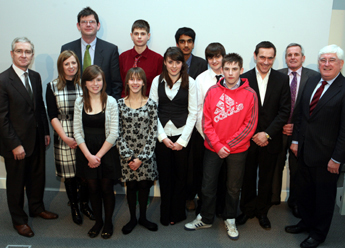 Some of the BT Young Scientist winners pictured with from left Dr Hugh Brady, President of UCD; Professor Mark Rogers, Dean of Science; Dr Orla Donoghue, UCD Science Programme Office; Mr Chris Clark, CEO BT Ireland; Mr Michael Kelly, Chairman, HEA and Minister for Education and Science, Mr Batt O’Keeffe TD