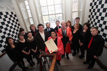 Cecilia Bartoli pictured at the award ceremony with the UCD Choral Scholars; Desmond Earley, Artistic Director, UCD Choral Scholars and Prof Harry White, UCD School of Music