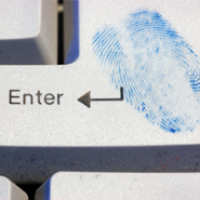 Cybercrime - Thumbprint on Keyboard
