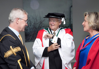Dr Noel Kinsella (centre) pictured with UCD President, Dr Hugh Brady and Prof Jane Koustas