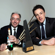 Pictured far right: Professor Brian Glennon and Dr Mark Barrett, co-founders of APC Ltd, after receiving their award