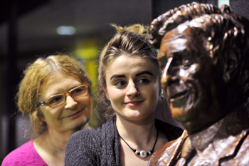Garret Fitzgerald's daughter Mary (left) and granddaughter Sorcha (centre) pictured alongside a specially commissioned bronze bust of Dr Garret Fitzgerald at the entrance to the new Fitzgerald Debating Chamber in the UCD Student Centre