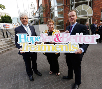 Professor John Fitzpatrick, Head of Research, Irish Cancer Society (left) with Sharon Burrell, Breast cancer survivor, and UCD Professor William Gallagher, Director of the Irish Cancer Society Collaborative Cancer Research Centre BREAST-PREDICT (right), pictured at the announcement.