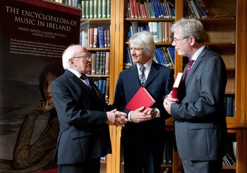 Pictured at the launch (l-r): President of Ireland Michael D Higgins and the General Editors of The Encyclopaedia of Music In Ireland: Prof Barra Boydell, Department of Music, NUI Maynooth; and Prof Harry White, UCD School of Music