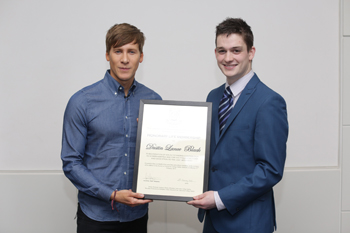 Dustin Lance Black presented with his award by Ian Fahey, Auditor of the UCD Law Society