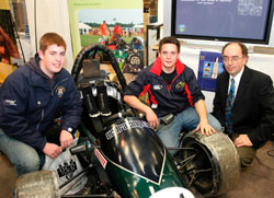Pictured at UCD Open Days: Dr Brian Glennon (Right), Senior Lecturer, Interim Vice-Principal for Teaching & Learning, College of Engineering, Mathematical & Physical Sciences meets with visiting leaving certificate students. The Formula style racing car featured in the photograph is designed and built by UCD Engineering Students as part of a yearly international competition in which 40 competitors from Europe and America conceive, design, fabricate and compete with small Formula style racing cars