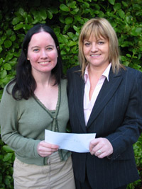 Shannon Byrne (left) receiving her scholarship from Mary Nolan, Group Marketing and Communications Manager, Anglo-Irish Bank.