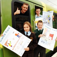 Pictured with DART train driver and their Science Track posters are Conor Burns (back right), Eimear Kelly and Dylan Kavanagh
